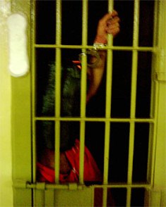 handcuffed prison